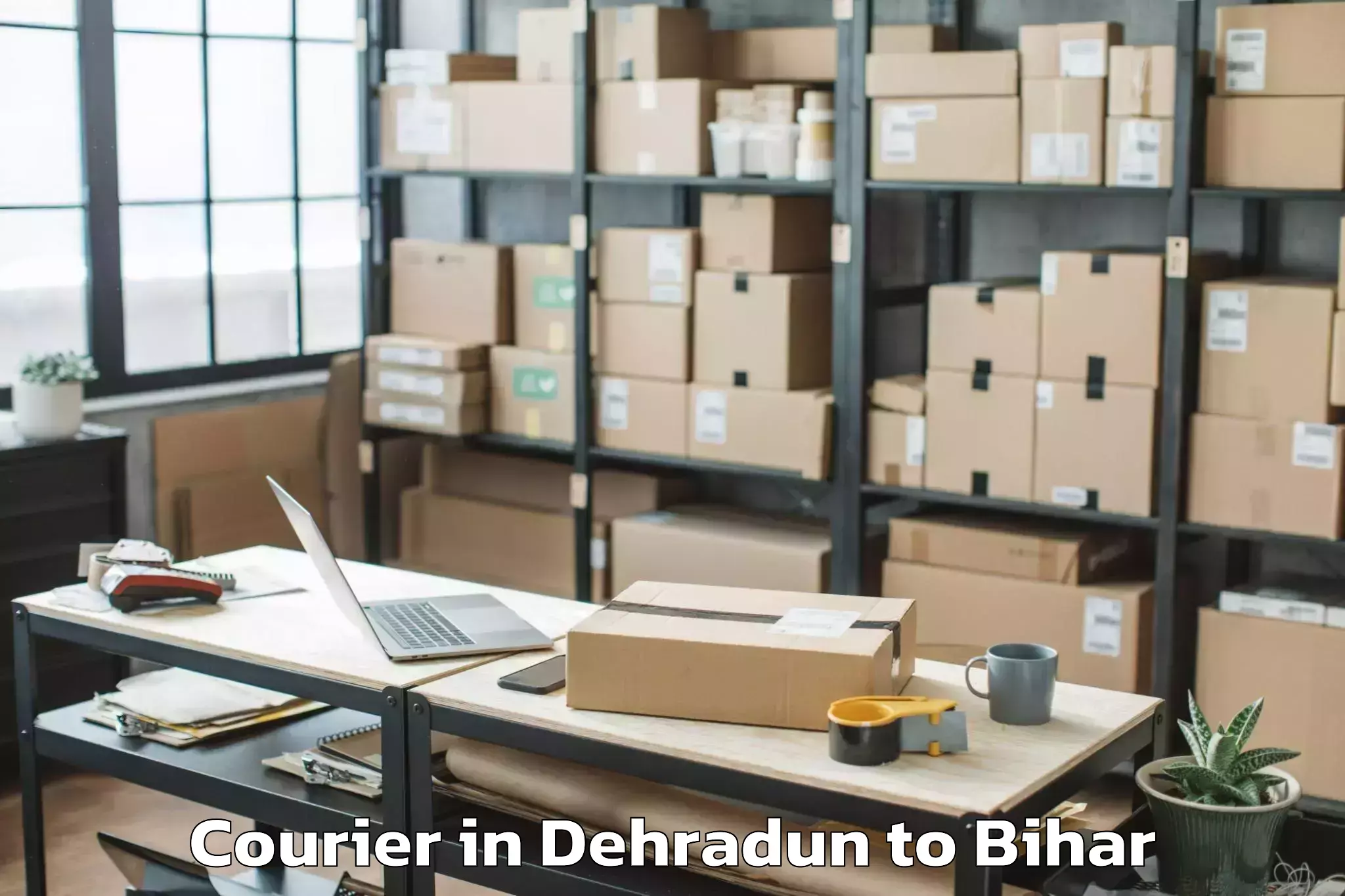 Trusted Dehradun to Ghanshampur Courier